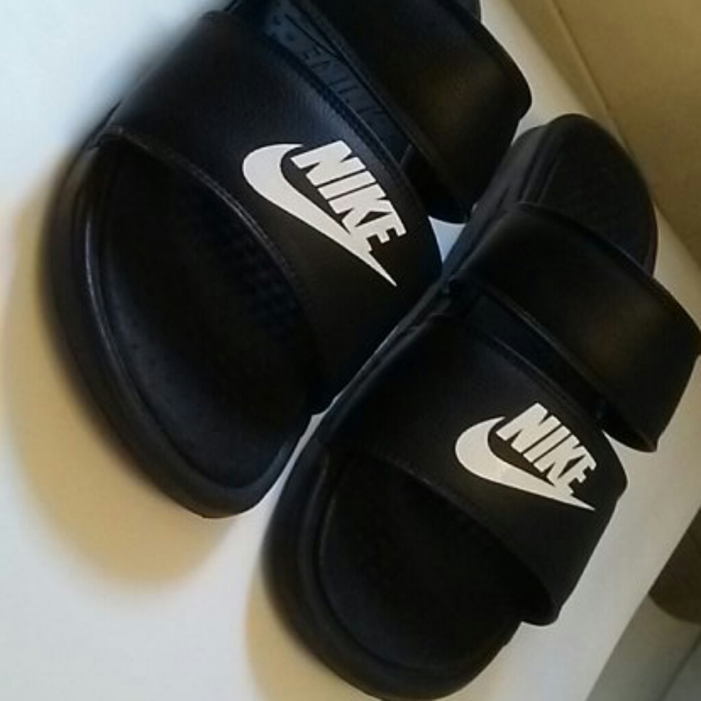 Black Nike slides